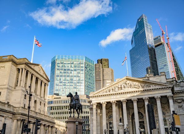 View of Bank of England, Royal Exchange, and Duke of Wellington equestrian statue (1844) with skyscrapers and construction in background.