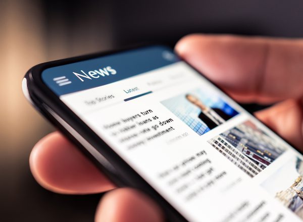 Reading news online on phone