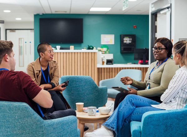 A group of healthcare professionals sitting in a staff common room in a hospital in Newcastle