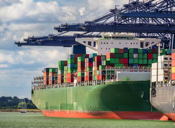 Cargo ship with shipping containers docked at Felixstowe