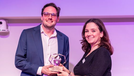 Harry Quilter-Pinner accepts an award on stage